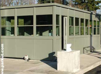 Pictured is a power plant entrance booth customized & designed for visitor check-ins. This booth has mid-range bullet resistant protection and is divided into 3 areas; guard, restroom, and visitor.