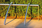 Landscape Forms adds polished steel bike rack to varied product line