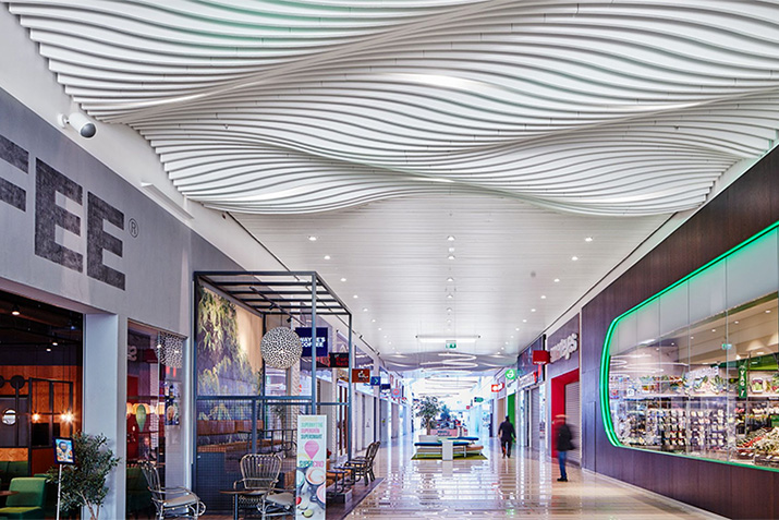 Acoustical design for open spaces with creative alternatives to suspended ceilings