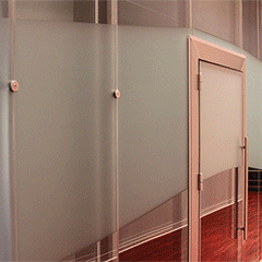 Aesthetically functional glass wall systems for commercial interior spaces