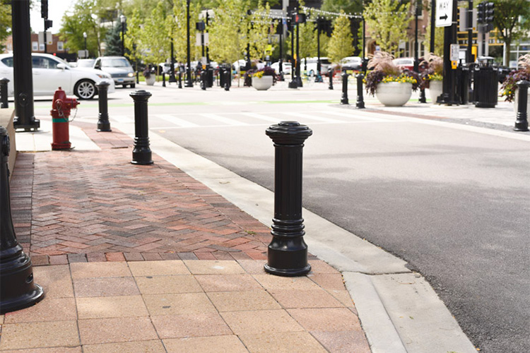 Decorative bollards can be installed on their own or slipped over anti-crash, anti-ram bollards.