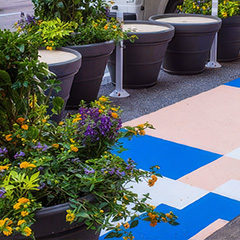 Enhancing Outdoor Dining Spaces with Planters for Security and Privacy