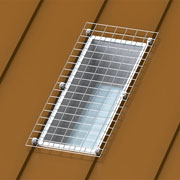 Flat Skylight Defender for Standing Seam Roofs