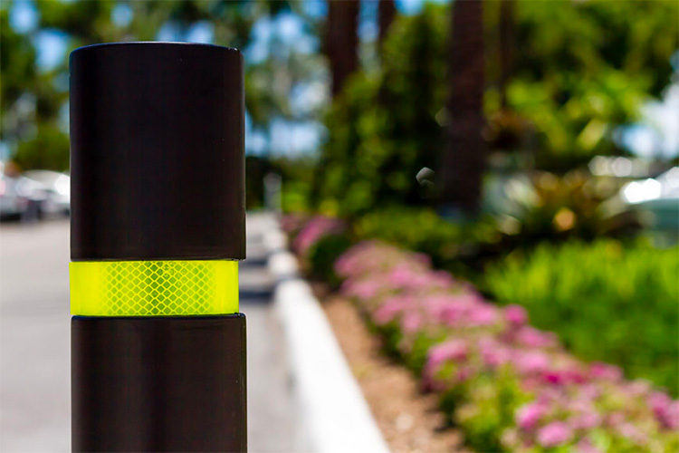 Flex-post bollards are useful on medians, in parking lots, and to mark bike lanes.
