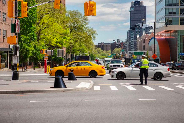 Although NYC taxis have changed over the years, they are still a distinctive part of the streetscape.