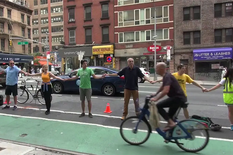 Human Bollard Campaigns Advocating for cyclist safety through direct action  Cyclists Become “Human Bollards” to Protect 2nd Ave Bike Lane from STREETFILMS on Vimeo.