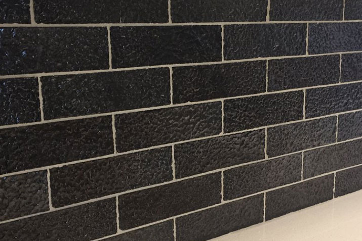 Metallic black is a dazzling new face brick