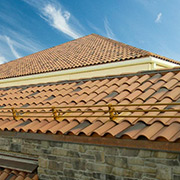 Snow Retention for Ludowici Tile Roofs: Protecting Premium Roofs