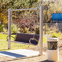 The Langdon™ Swing bench: perfect in parks, courtyards, and any place where comfort and gathering takes place