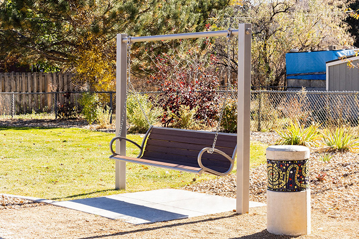 The Langdon™ Swing bench: perfect in parks, courtyards, and any place where comfort and gathering takes place