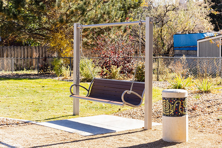 The Langdon™ Swing bench: perfect in parks, courtyards, and any place where comfort and gathering takes place