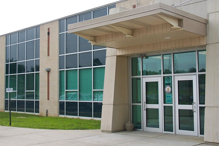 What industries should utilize bullet-resistant glass?